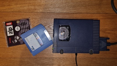 Top view of Z100P2 drive with 100 MB Zip disk in front.